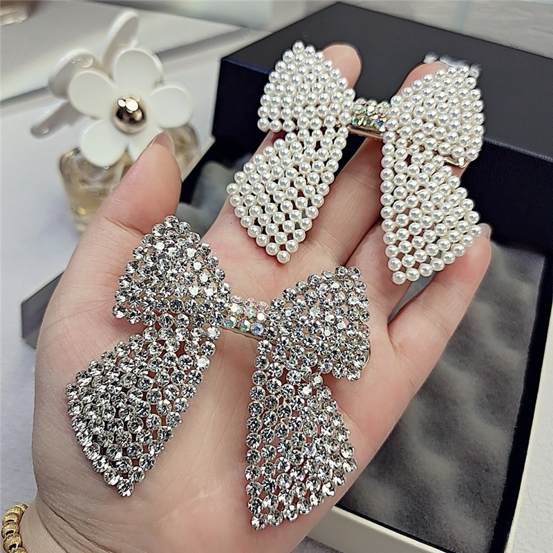 Tie Bar Clip - Rhinestone Pearl Bow spinki do włosów
